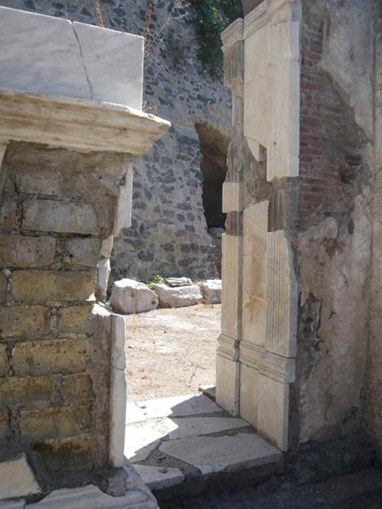 Herculaneum. August 2013. Looking north-east between statue base and structure.
Photo courtesy of Buzz Ferebee.